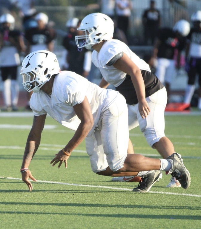 Lucas Duryea #42 & Justin Priestly #10 in scrimmage action.