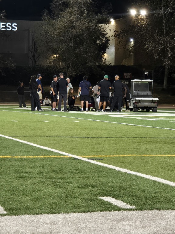Player down for Bonita. Getting the cart for him. Took a big shot in the end zone