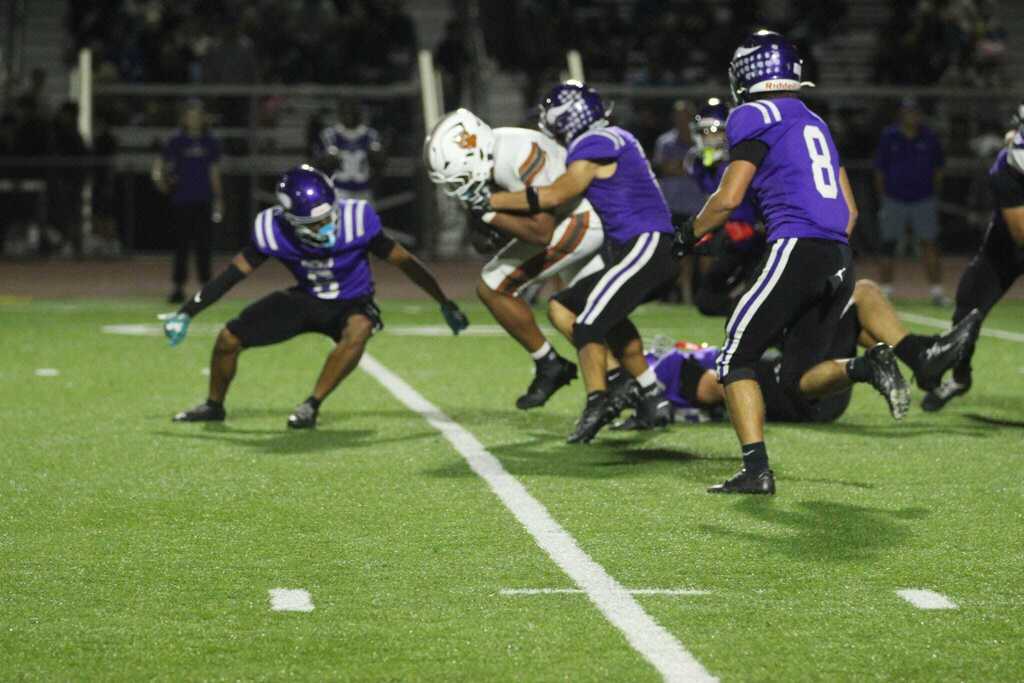 Justin Priestly fighting for that extra yardage!