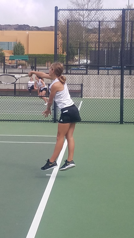 Sophia Moncur battling for a win in tight finish. Sage up 9.8 with last 3 singles matches still competing!