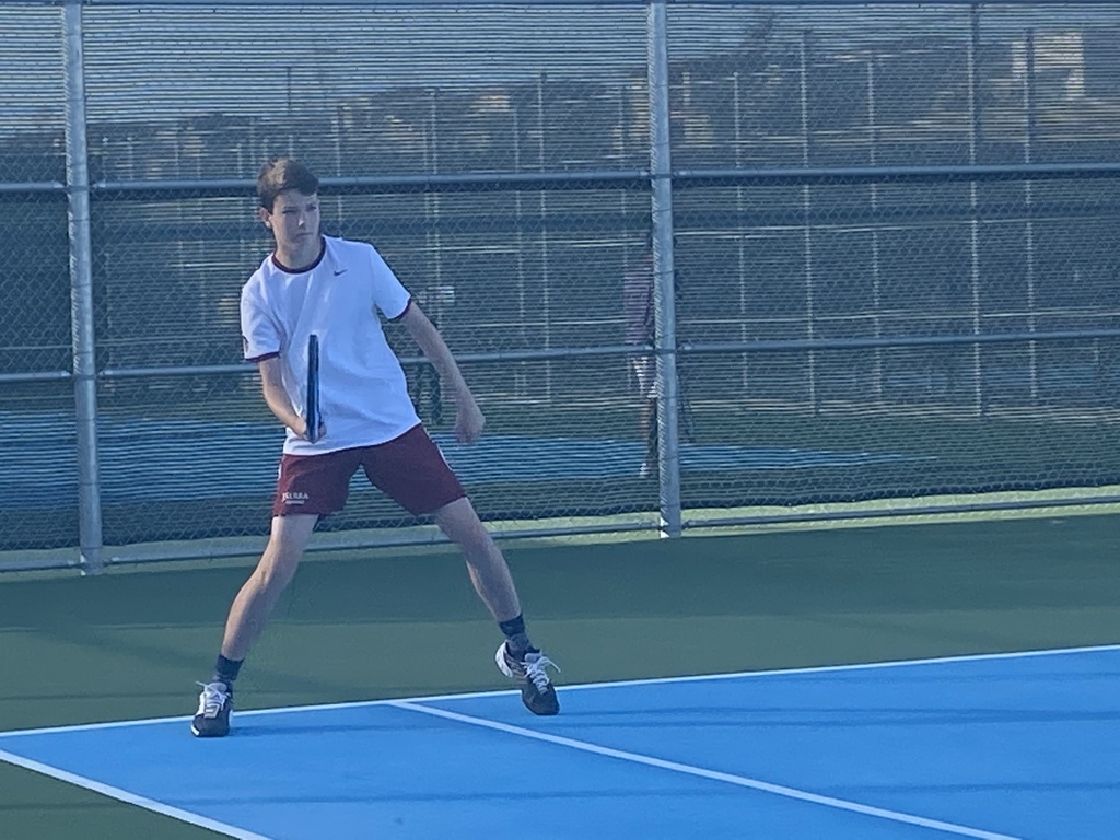 Michael Woodward returns forehand vs Portola.