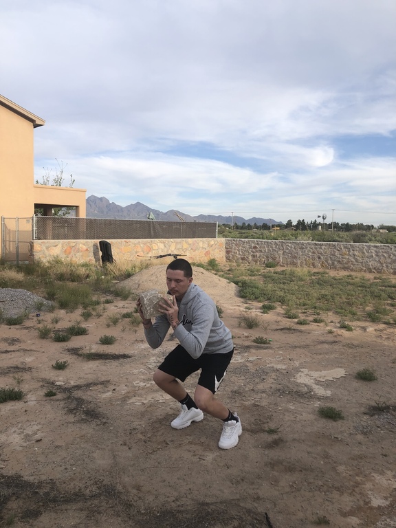 Throwing rocks after the squat.
