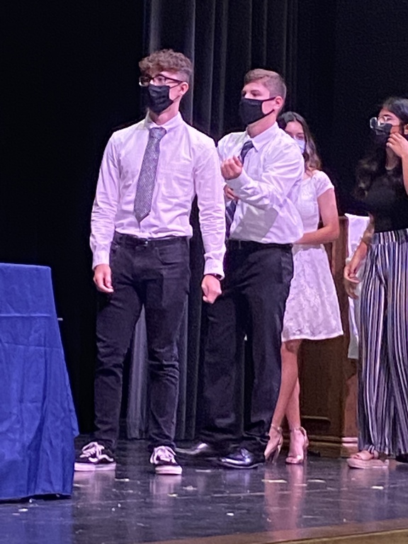Jacob Nalls and Andrew Maddron getting inducted into NHS