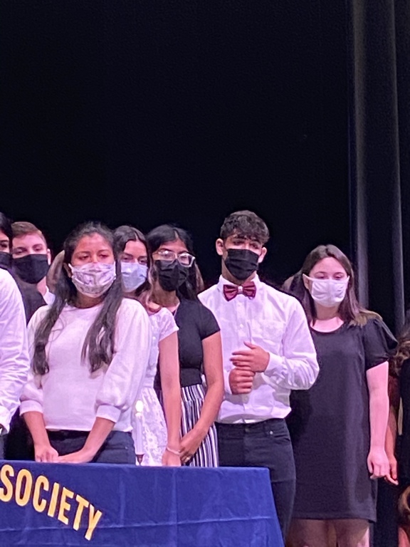 Carlos Ramirez being inducted into NHS