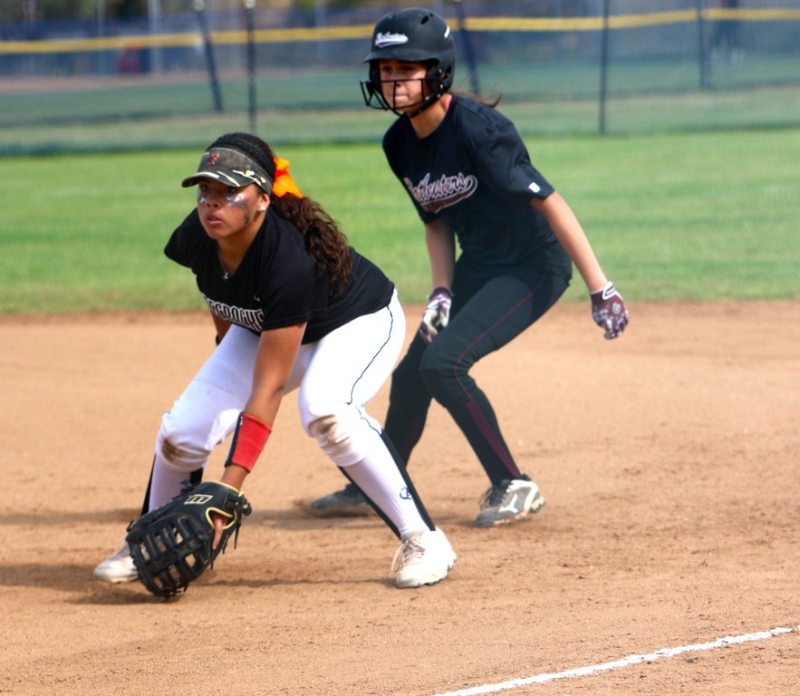 Izabella Martinez playing 1st base against Batbusters Campbell