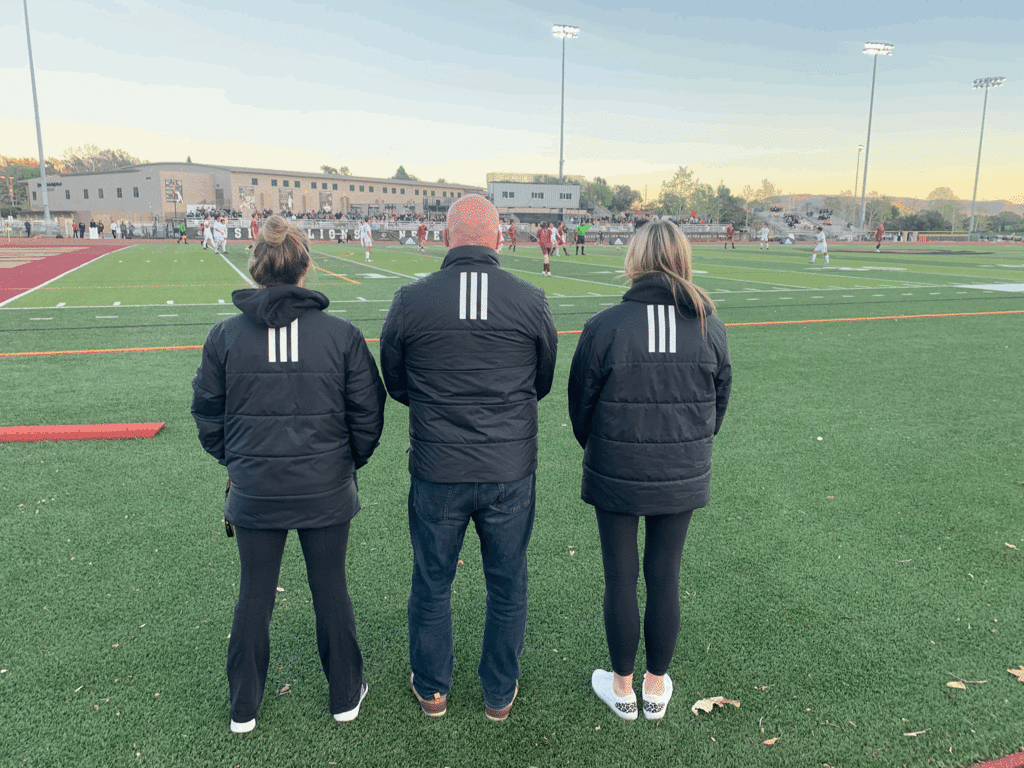 They come in threes! Our Athletic department support fans! (Left to right, Kasey Kavanagh, Chris Ledyard and Lori Culwell)